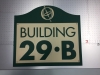 Routed recycled, 2 color plastic building unit signs. 50 year outdoor durability,maintenance free